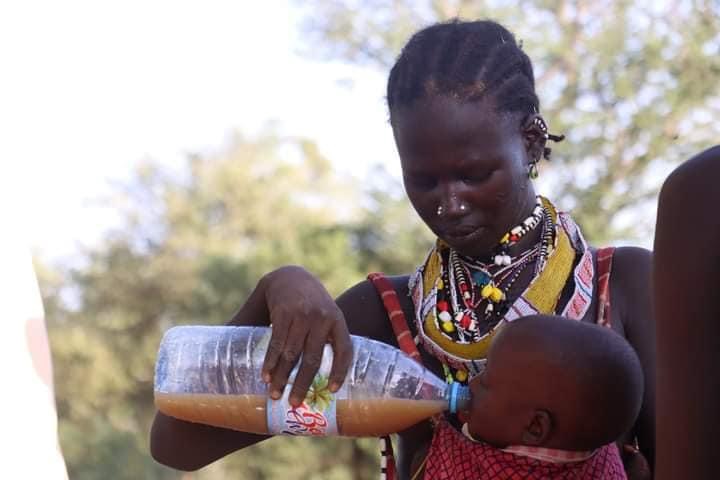 Baby drinking dirty water  