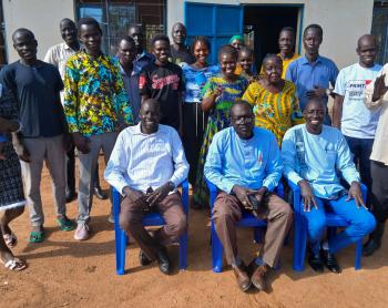 Pastors pose for a photo after the theological training
