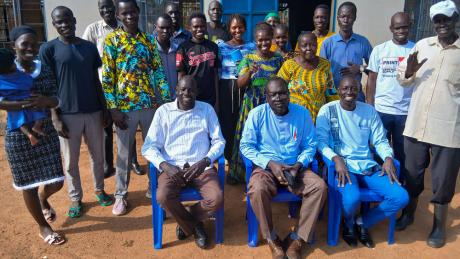 Pastors pose for a photo after the theological training
