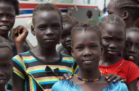 Children gather at the airstrip upon arrival of the MAF plane, South Sudan
