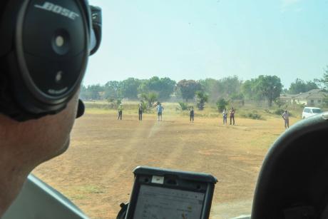 Pilot Jono Pound landing in Torit