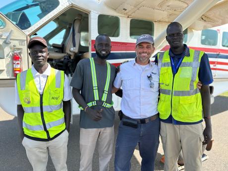 Dave Forney with MAF South Sudan Dispatchers Wek, Gur and Daniel
