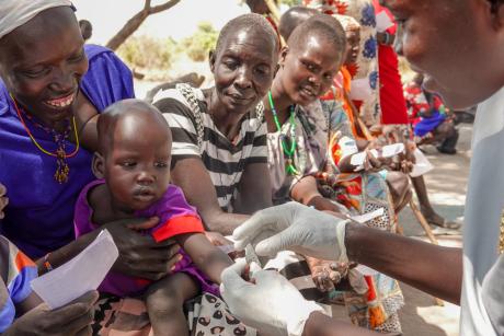 Clinical Assistant Viola tests patients for Malaria  