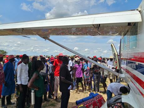 Passengers disembark at Bichibich Airstrip 