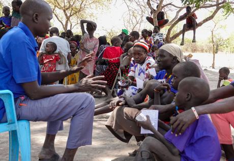 Pastors pray for patients after they have been seen by the doctors 